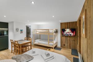 Postel nebo postele na pokoji v ubytování Studio élégant au cœur des Alpes