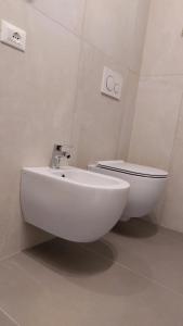 Koupelna v ubytování Albergo Primavera