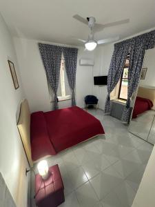 Postel nebo postele na pokoji v ubytování Paradiso B&B