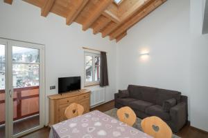 TV a/nebo společenská místnost v ubytování Casa Chatrian