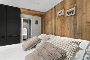 Postel nebo postele na pokoji v ubytování Studio rénové au centre de Saas-Fee