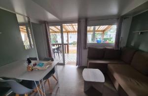 Posezení v ubytování Cosy et chaleureux, 2 ch, 2 sdb pour votre confort, super équipé