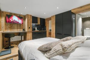 Katil atau katil-katil dalam bilik di Studio rénové au centre de Saas-Fee