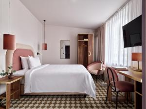 Postel nebo postele na pokoji v ubytování Hotel Pietryna