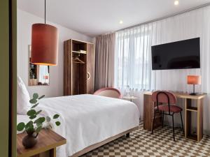 Postel nebo postele na pokoji v ubytování Hotel Pietryna