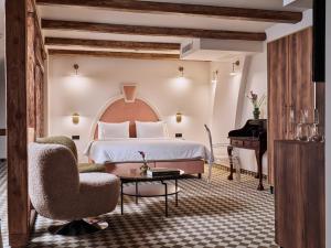 Postel nebo postele na pokoji v ubytování Hotel Pietryna