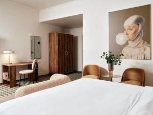 Postel nebo postele na pokoji v ubytování Hotel Pietryna