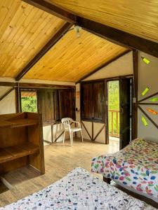 Postel nebo postele na pokoji v ubytování Hostal Pachamama