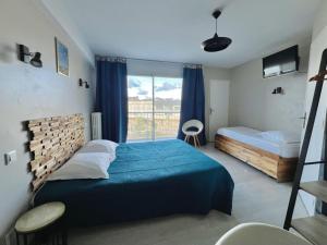 Postel nebo postele na pokoji v ubytování Hôtel Le Littoral - Berck sur Mer