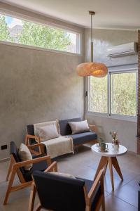 Posezení v ubytování La Quebrada Potrerillos - Lodges de Montaña + 54 fotografií