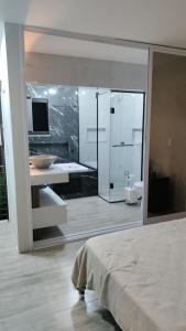 Postel nebo postele na pokoji v ubytování Suíte Máster Luxo - Lar-Doce-Mar