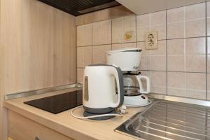 Kuchyňa alebo kuchynka v ubytovaní Apartments Nadica