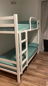 a couple of bunk beds in a room at La Hospedería in Oviedo