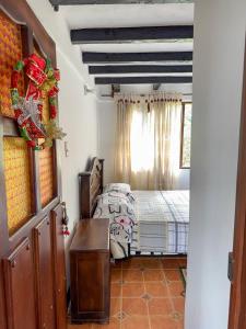 Postel nebo postele na pokoji v ubytování Hostal Pachamama