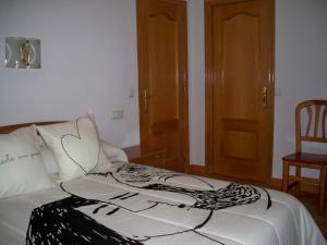 Posteľ alebo postele v izbe v ubytovaní Hostal "Los Chanos el Ruso"