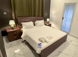 Postel nebo postele na pokoji v ubytování VIP Kumbis Luxury 2 Bedroom Apartment