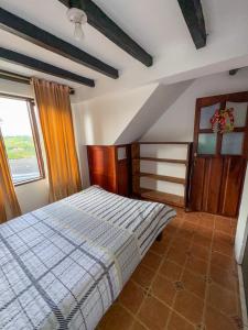 Postel nebo postele na pokoji v ubytování Hostal Pachamama