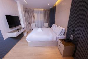 TV a/nebo společenská místnost v ubytování Remal Pyramids Hotel