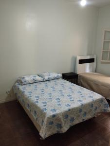 Katil atau katil-katil dalam bilik di Casa temporada Cabo Frio