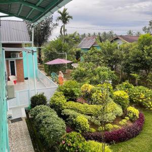 an aerial view of a garden in front of a house at Petra Garden in Sungailiku
