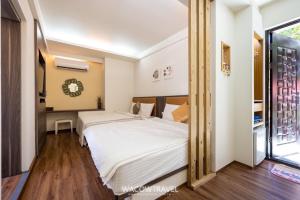 Tian Lan Hai B&B 객실 침대