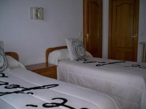 Posteľ alebo postele v izbe v ubytovaní Hostal "Los Chanos el Ruso"