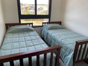 Katil atau katil-katil dalam bilik di Departamento Concon