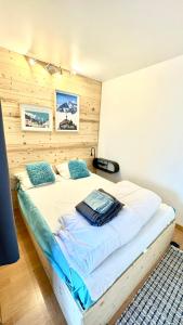 Ένα ή περισσότερα κρεβάτια σε δωμάτιο στο Apartement vue montage magnifique 2ch 5mn piste 3