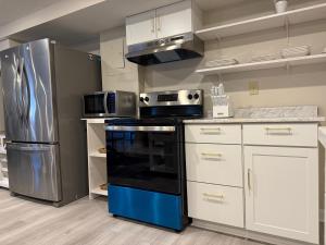 Kuchyň nebo kuchyňský kout v ubytování Poolside Apartment at Hot ATL