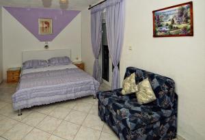 Ein Bett oder Betten in einem Zimmer der Unterkunft Apartments Marina