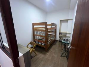 Μία ή περισσότερες κουκέτες σε δωμάτιο στο Casa Elhi 4