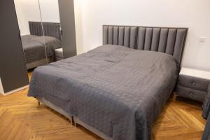 Ένα ή περισσότερα κρεβάτια σε δωμάτιο στο Stylisches Premium Apartment am Hellweg mit Komfort und WLAN inklusive
