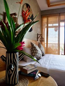 Postel nebo postele na pokoji v ubytování Coast 67 Boutique Hotel