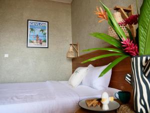 Postel nebo postele na pokoji v ubytování Coast 67 Boutique Hotel