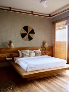 Postel nebo postele na pokoji v ubytování Coast 67 Boutique Hotel