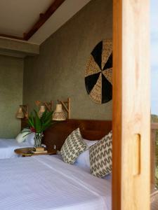 Postel nebo postele na pokoji v ubytování Coast 67 Boutique Hotel