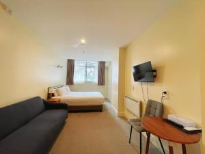 TV a/nebo společenská místnost v ubytování Grand Central Serviced Apartments