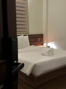 Letto o letti in una camera di Hong Nhan Hotel