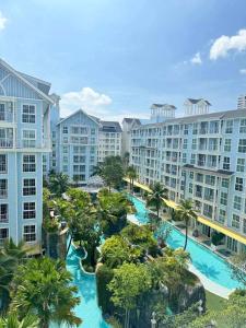 an aerial view of a resort with a pool at Grand florida pattaya beach front in Na Jomtien +106 photos