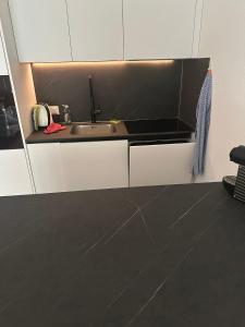 Kuchyň nebo kuchyňský kout v ubytování Résidence « Les Crêtes »