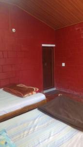 Postel nebo postele na pokoji v ubytování Athena Homestay