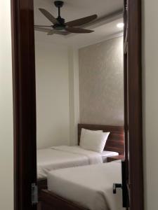 Letto o letti in una camera di Hong Nhan Hotel
