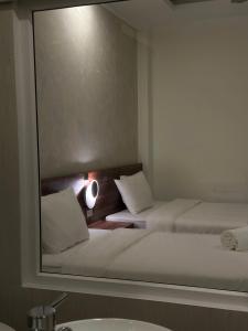 Letto o letti in una camera di Hong Nhan Hotel