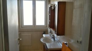 Koupelna v ubytování B&B Gelsimori + 11 fotografií
