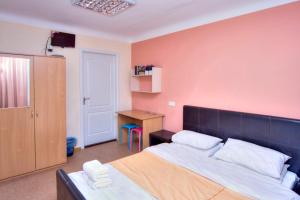 Posteľ alebo postele v izbe v ubytovaní Hostel Podolski Plus