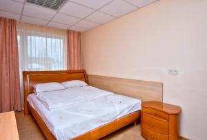 Posteľ alebo postele v izbe v ubytovaní Hostel Podolski Plus