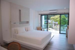 Letto o letti in una camera di Ton Sai Tropical Phi Phi Island