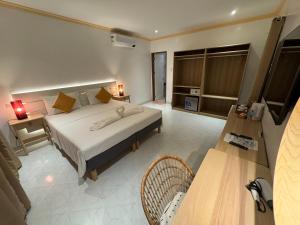 Postel nebo postele na pokoji v ubytování Alona Vida Beach Resort