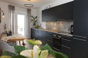 Kuchyň nebo kuchyňský kout v ubytování Ferienhaus Viktoria
