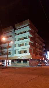 a large building on a city street at night at Hotel Valgrande in Coatzacoalcos